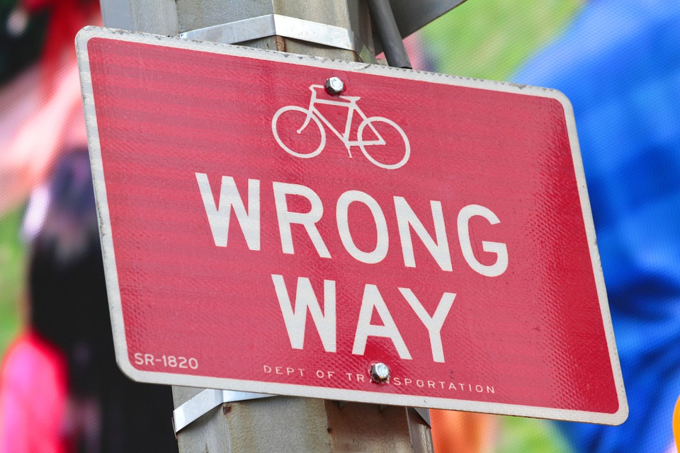 Wrong way: don't steer people the wrong way and inadvertently give inappropriate hints by using misplaced modifiers and misusing the comma. You might need an editor or proofreader to help you out in that department!